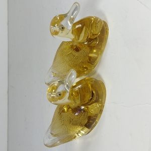 ACRYLIC 2 DUCKS FIGURINES  WITH SYMBOLIC US QUARTERS FLOATING INSIDE THE DUCK
